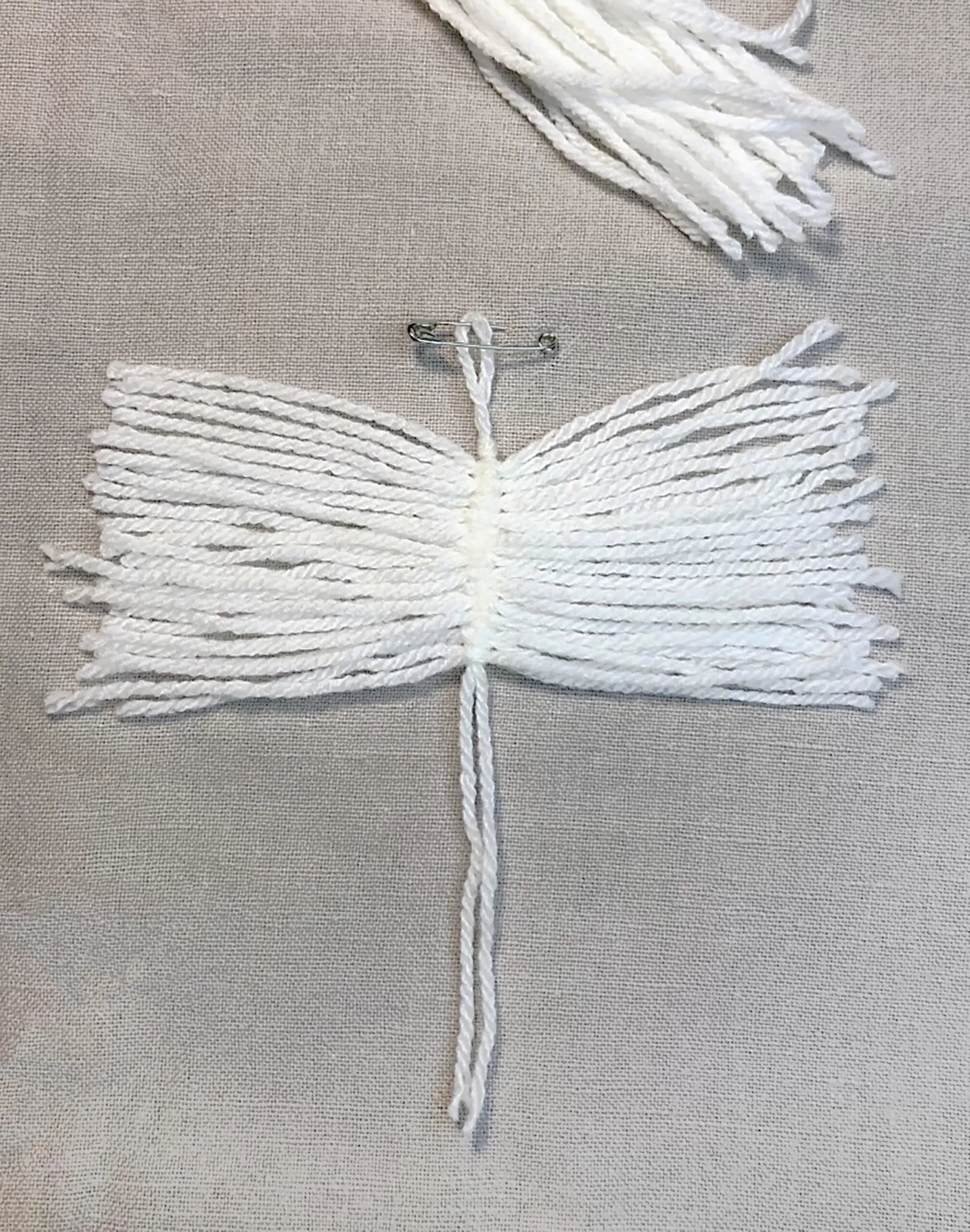 Tuto plume en laine étape 7 Tuto plume en laine étape 7
